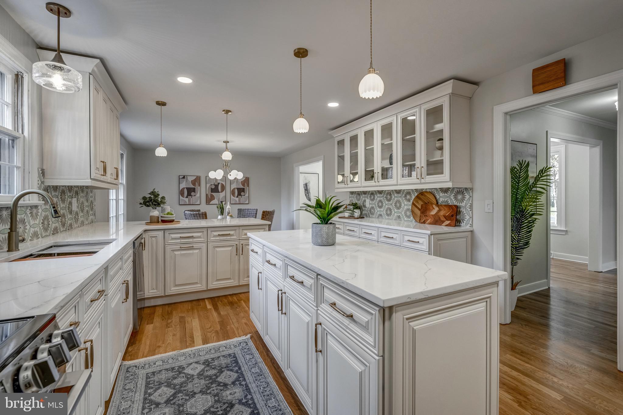 1771 Robindale Road North Chesterfield, VA 23235 - Photo 24 of 67 a kitchen with a sink and a stove top oven