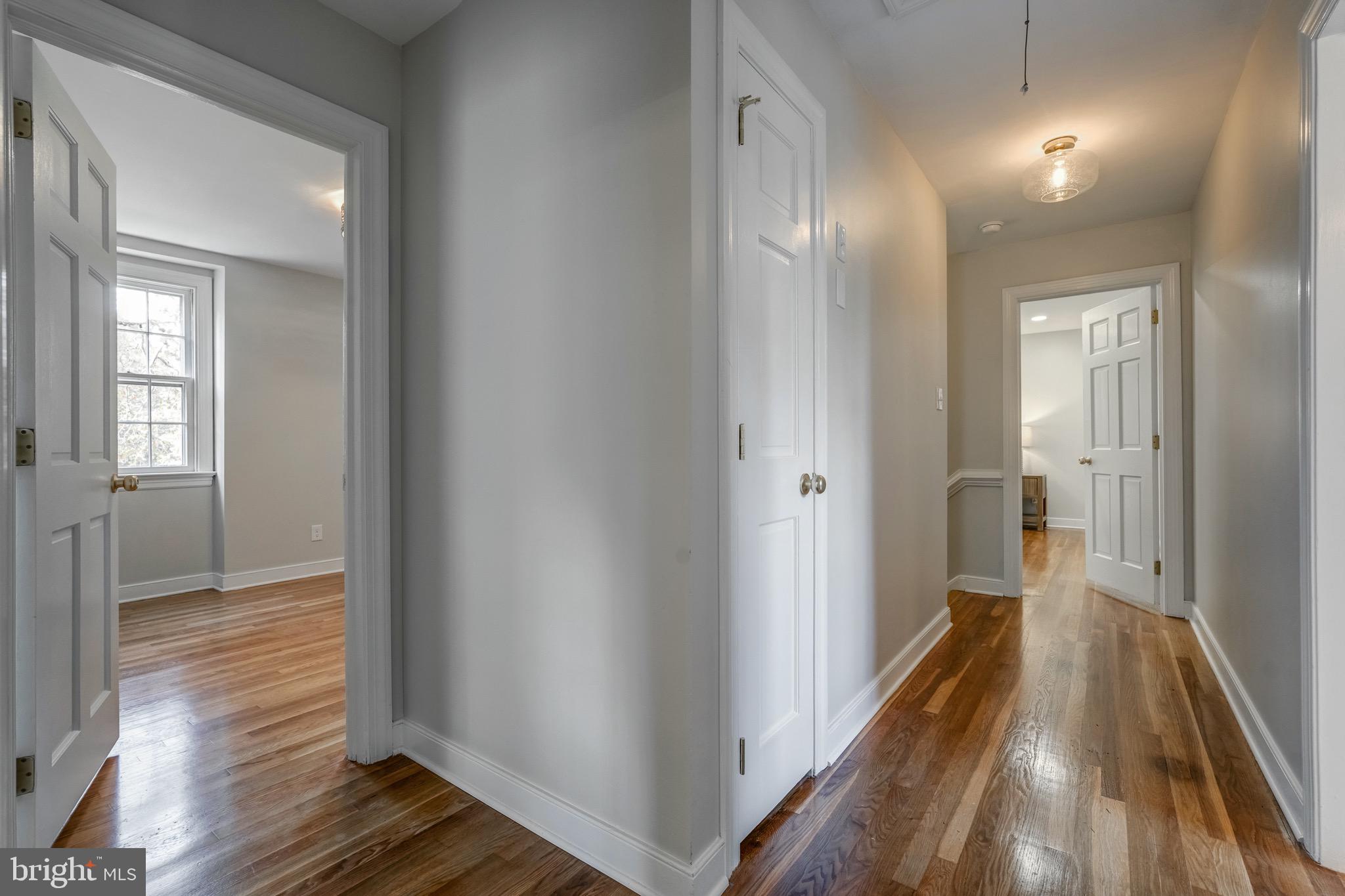 1771 Robindale Road North Chesterfield, VA 23235 - Photo 38 of 67 a view of a hallway with wooden floor and staircase