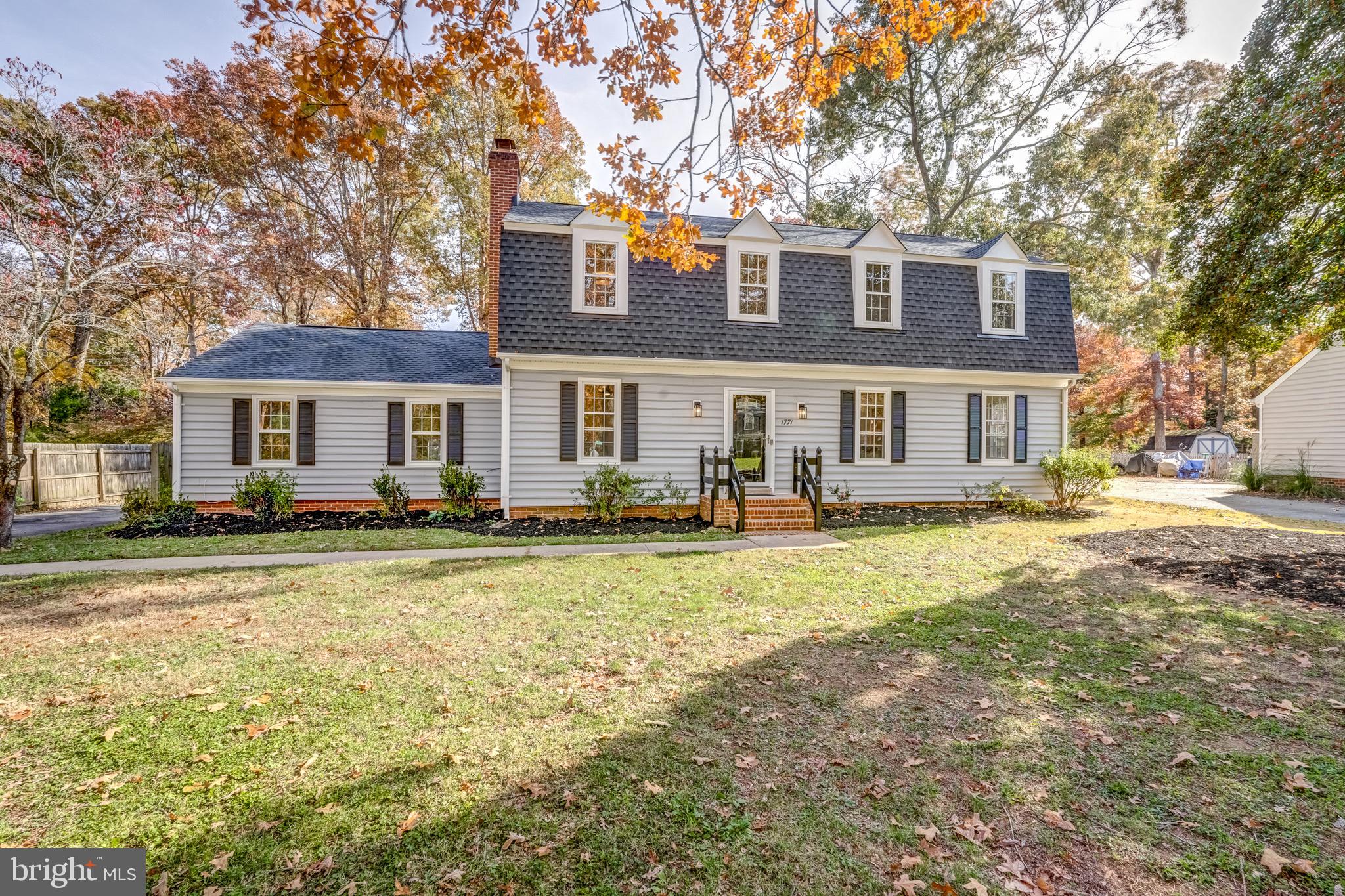 1771 Robindale Road North Chesterfield, VA 23235 - Photo 4 of 67 a front view of a house with a yard
