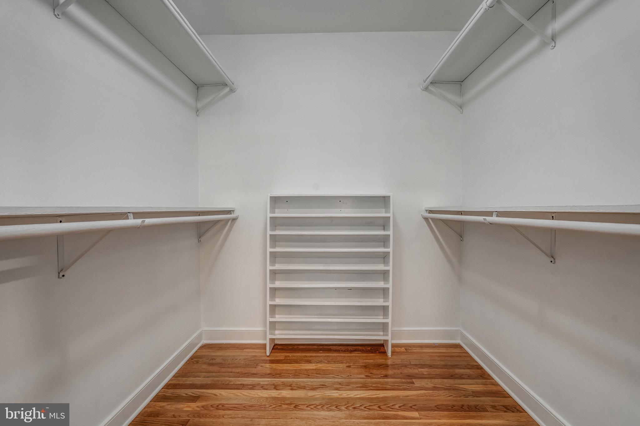 1771 Robindale Road North Chesterfield, VA 23235 - Photo 42 of 67 a view of walk in closet with empty racks
