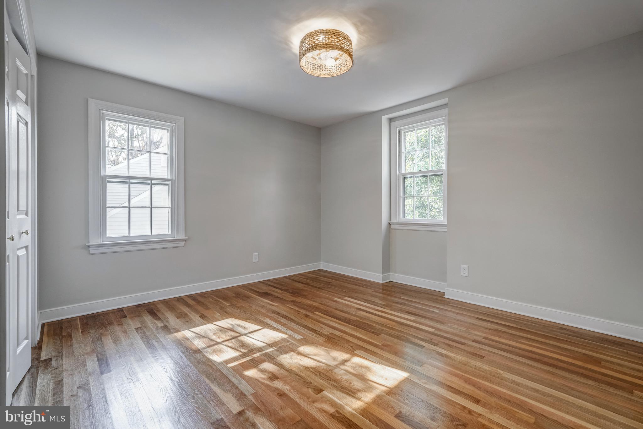 1771 Robindale Road North Chesterfield, VA 23235 - Photo 50 of 67 a view of an empty room with wooden floor and a window