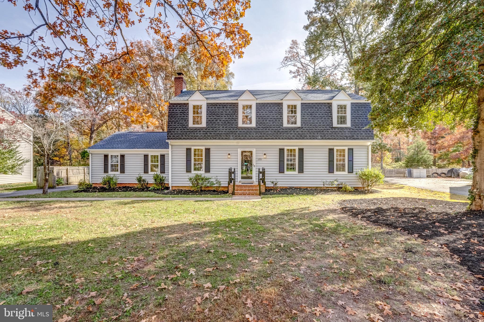 1771 Robindale Road North Chesterfield, VA 23235 - Photo 5 of 67 a front view of a house with a yard