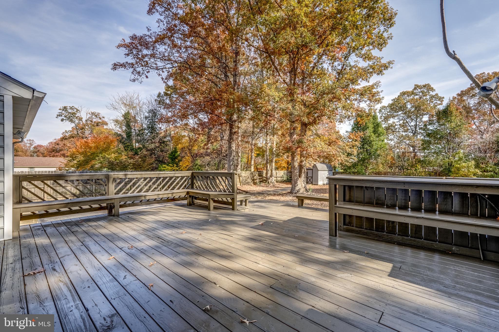 1771 Robindale Road North Chesterfield, VA 23235 - Photo 63 of 67 a view of a roof deck with wooden floor and fence