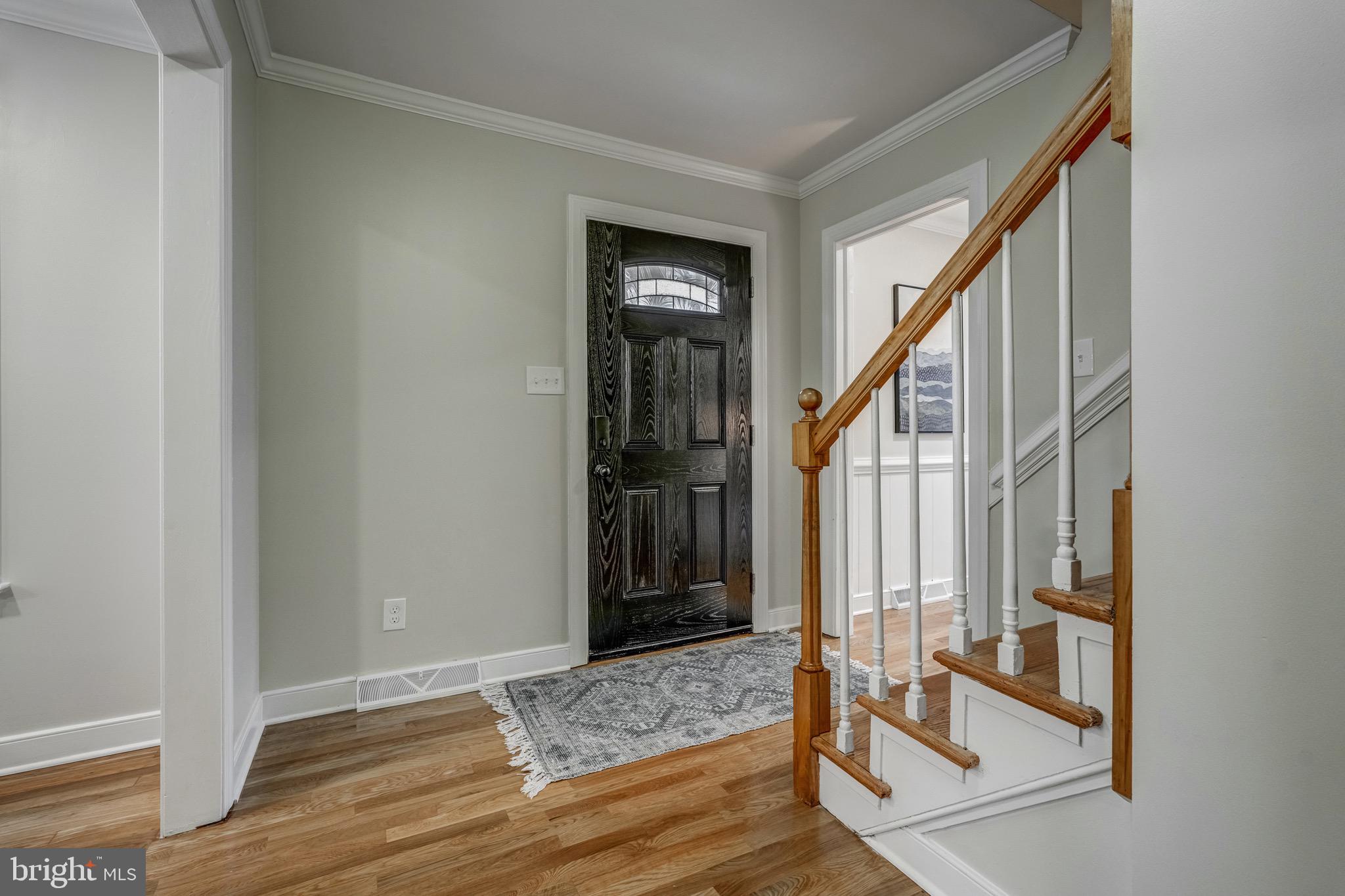1771 Robindale Road North Chesterfield, VA 23235 - Photo 8 of 67 a view of front door of stairs
