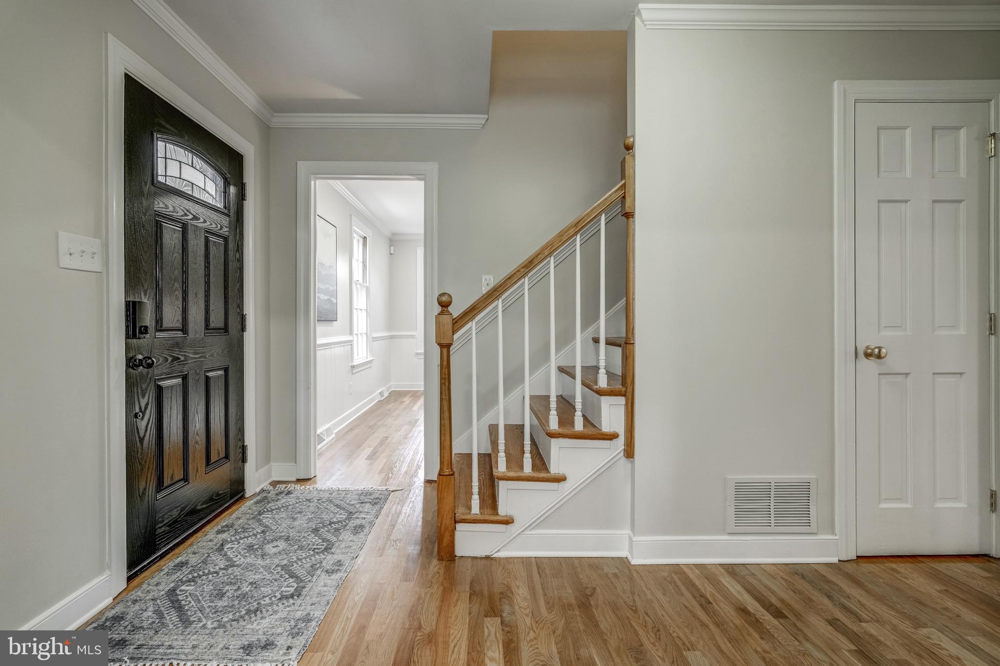 1771 Robindale Road North Chesterfield, VA 23235 - Photo 9 of 67 a view of entryway and hall with wooden floor