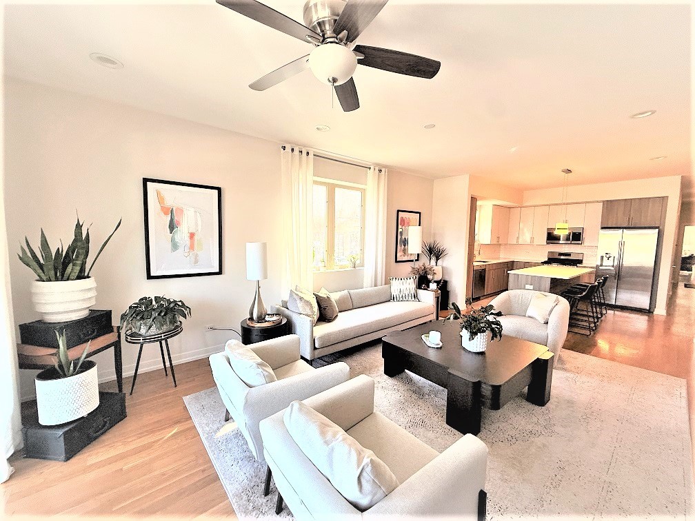 2835 West Division Street, Unit 2E Chicago, IL 60622 - Photo 6 of 33 a living room with furniture and a large window