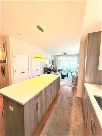 a spacious bathroom with a tub and a sink