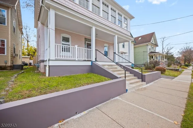a view of a house with a swimming pool