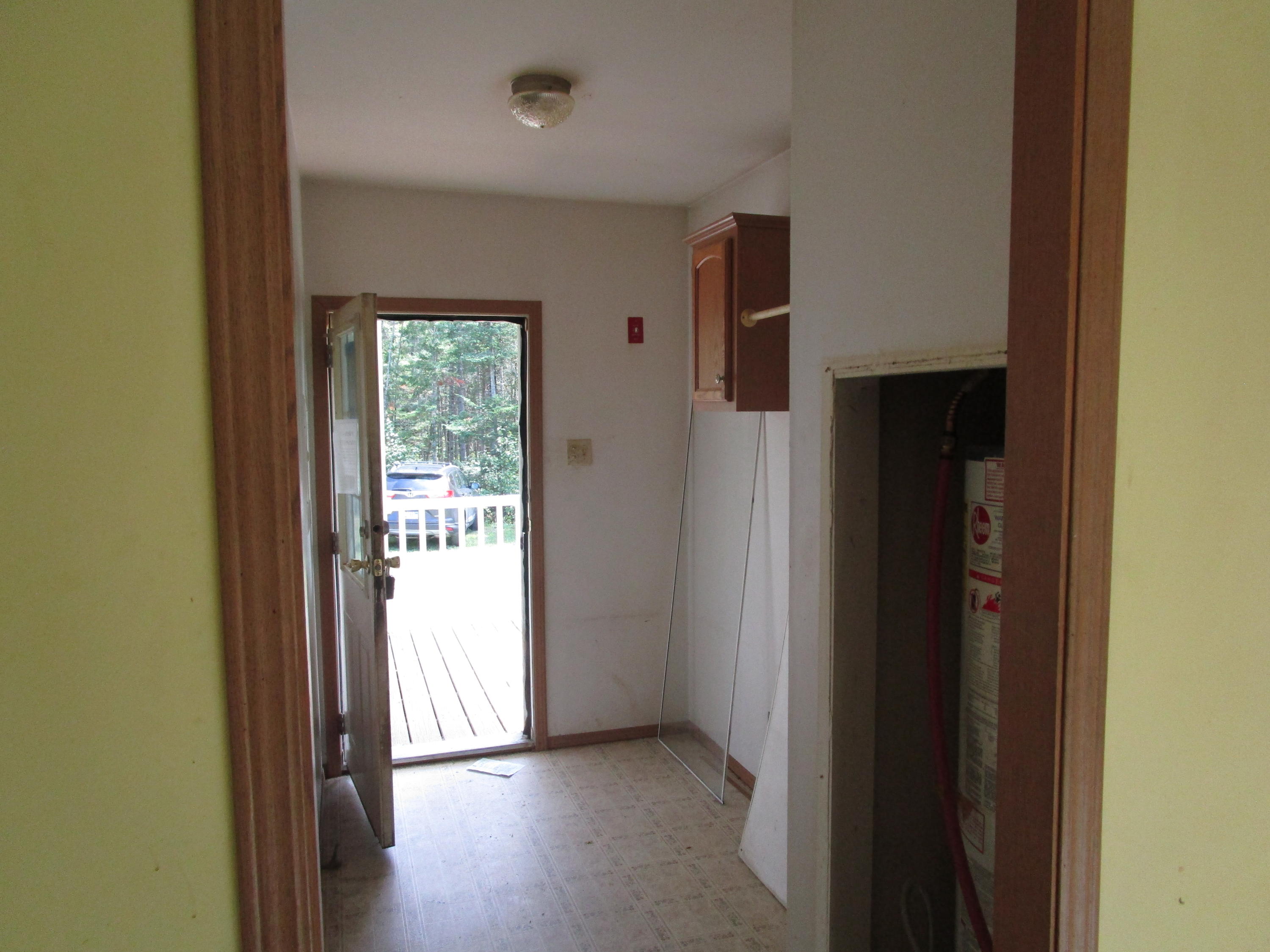 621 County Road Milford, ME 04461 - Photo 11 of 18 Porch Entrance