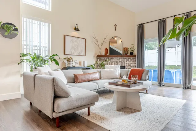 a bathroom with a granite countertop sink a toilet and a bathtub
