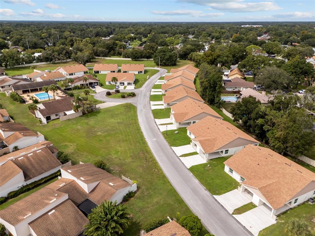 4078 Oak Loop Mulberry, FL 33860 - Photo 14 of 19 an aerial view of a house with a garden