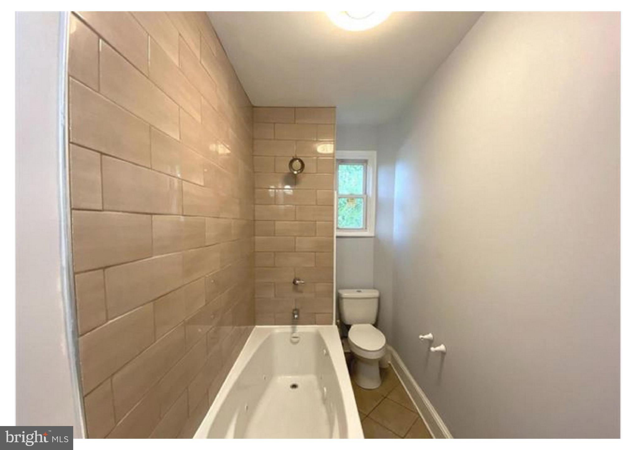 775 South Front Street Philadelphia, PA 19147 - Photo 6 of 6 a bathroom with a toilet and a shower