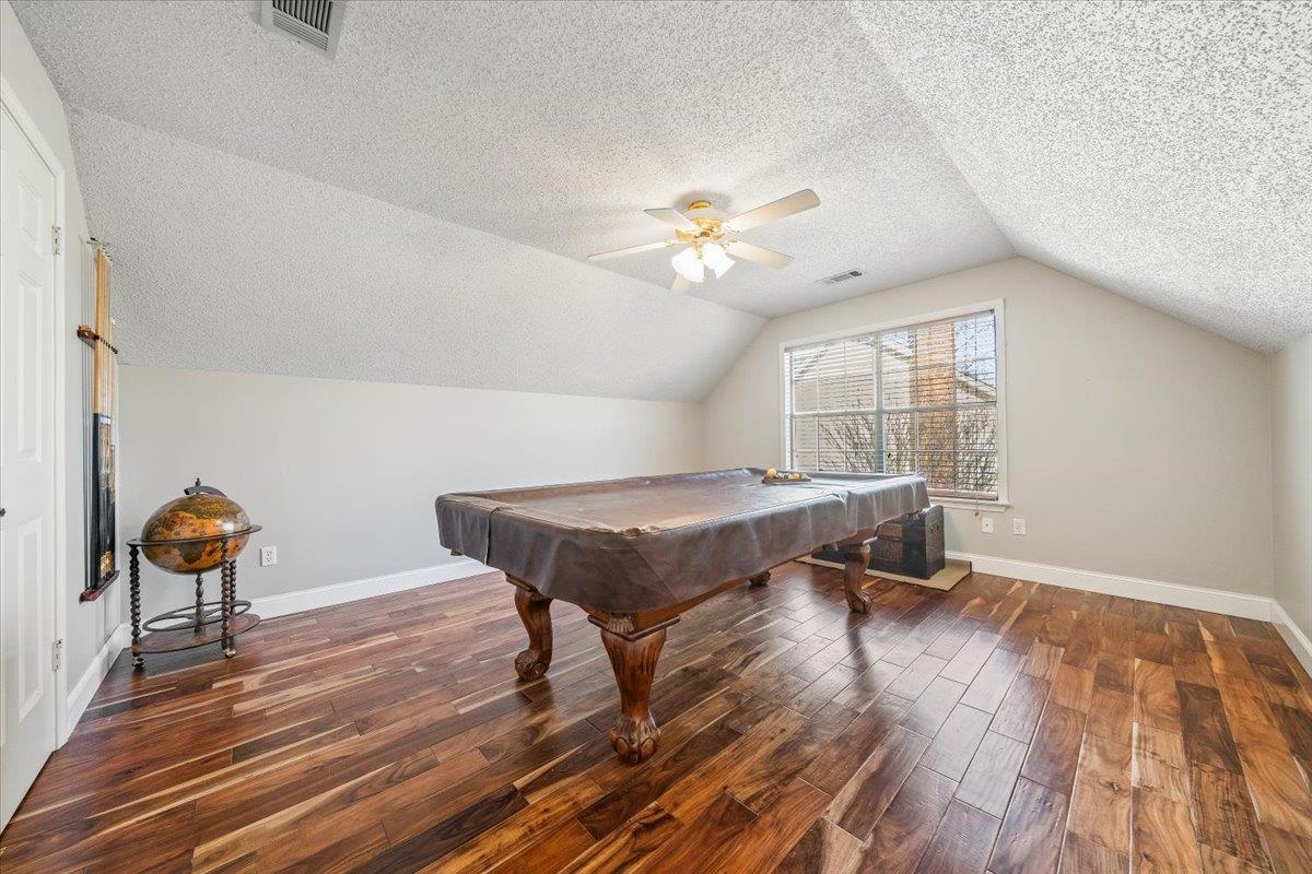 3204 Falling Star Cove Bartlett, TN 38134 - Photo 25 of 36 a view of a room with furniture and a chandelier