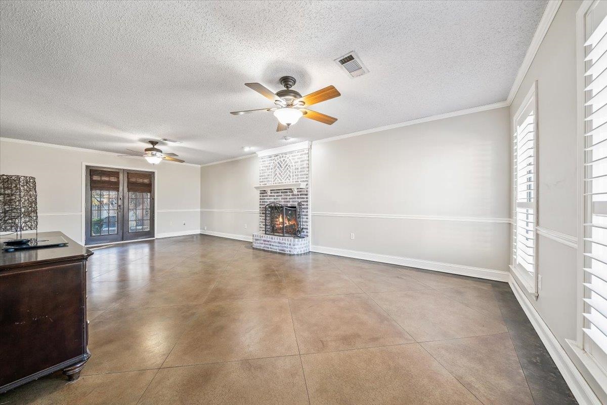 3204 Falling Star Cove Bartlett, TN 38134 - Photo 5 of 36 wooden floor in an empty room with a window