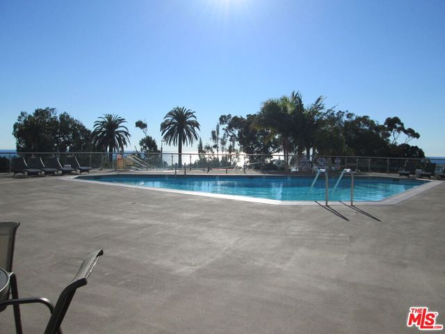 a view of a livingroom with wooden floor