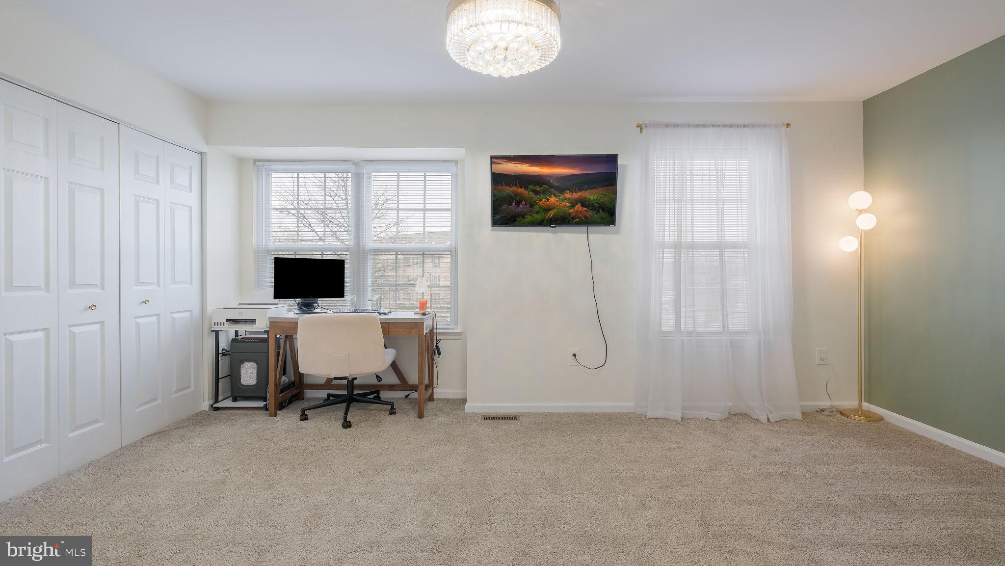 125 Catherine Street, Unit 5 Telford, PA 18969 - Photo 24 of 29 a view of a livingroom with furniture and a flat screen tv