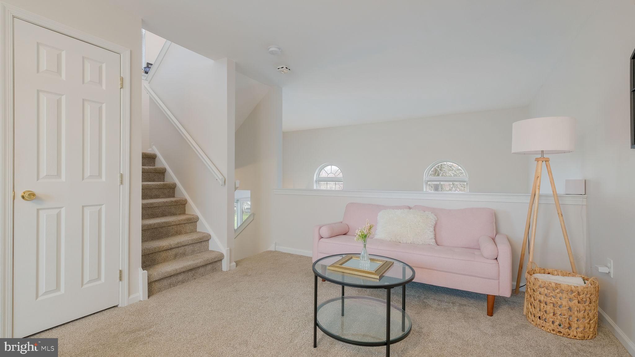 125 Catherine Street, Unit 5 Telford, PA 18969 - Photo 10 of 29 a living room with furniture and a stairs
