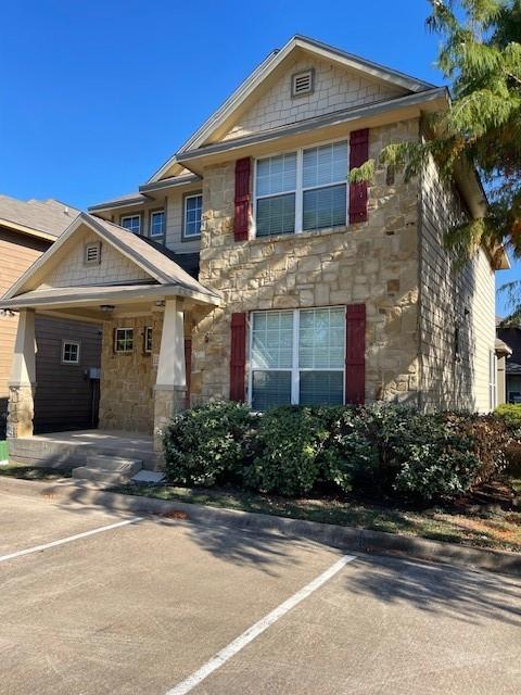 2513 South 2nd Street, Unit 3 Waco, TX 76706 - Photo 3 of 35 a front view of a house with a garden