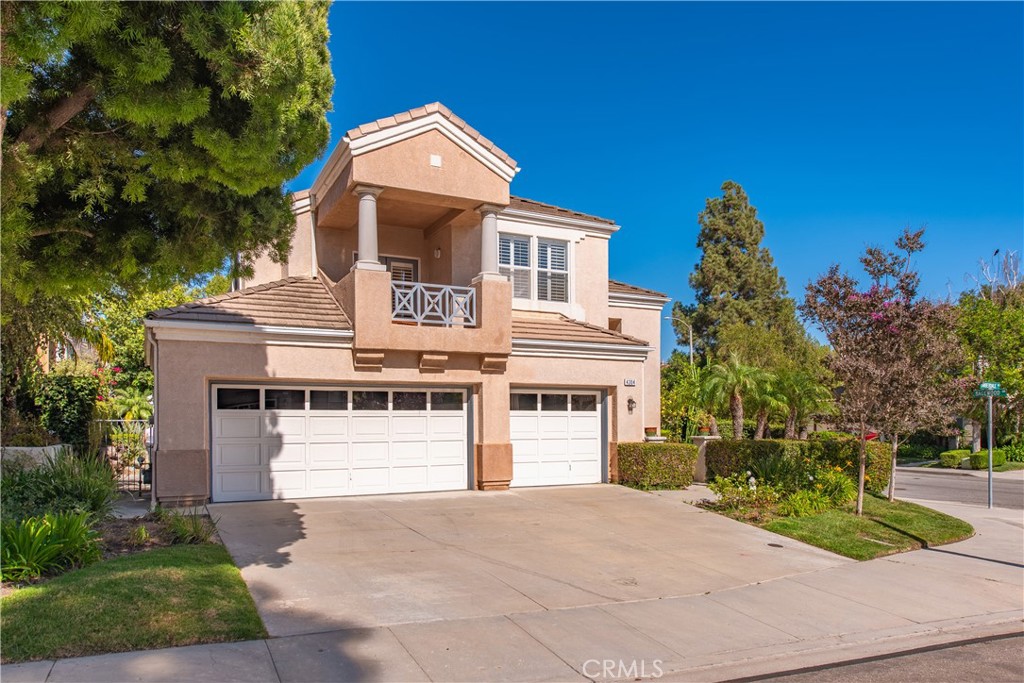 4304 Timberdale Road Moorpark, CA 93021 - Photo 1 of 1 a front view of a house with a yard and garage
