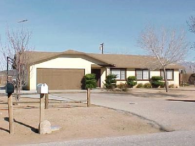 11871 Jamacha Road Apple Valley, CA 92308 - Photo 1 of 1 a view of a house with a patio
