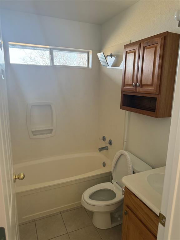 1451 Lakeside Trail Whitney, TX 76692 - Photo 17 of 18 a bathroom with a sink toilet and shower