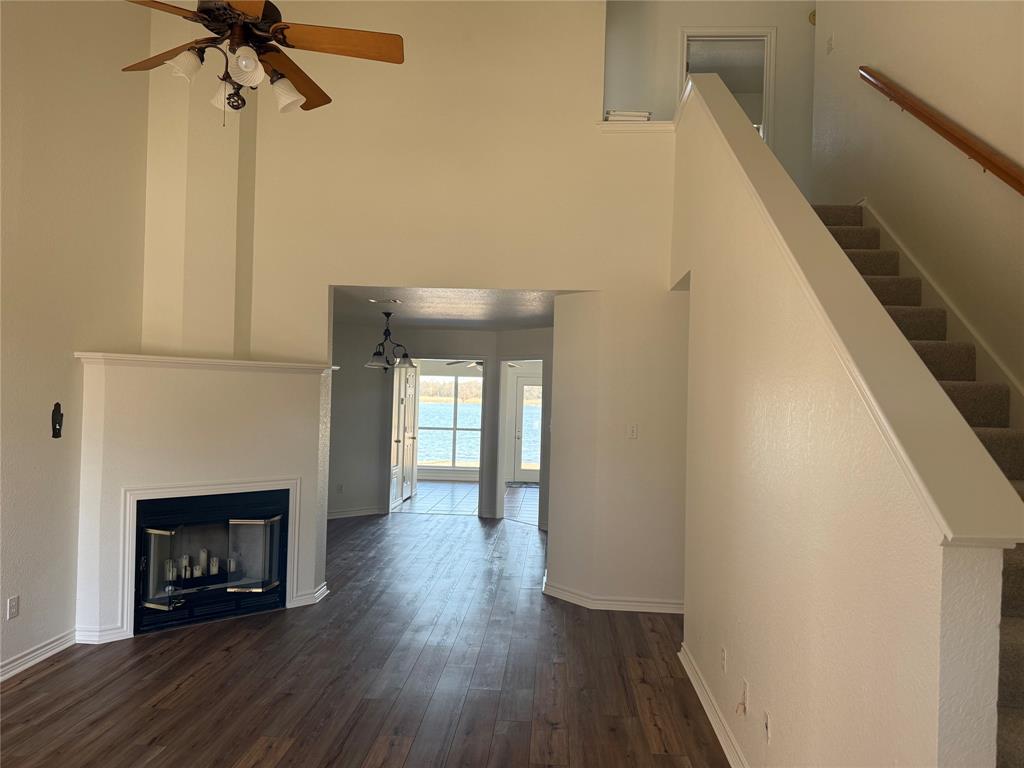 1451 Lakeside Trail Whitney, TX 76692 - Photo 4 of 18 a view of empty room with a fireplace