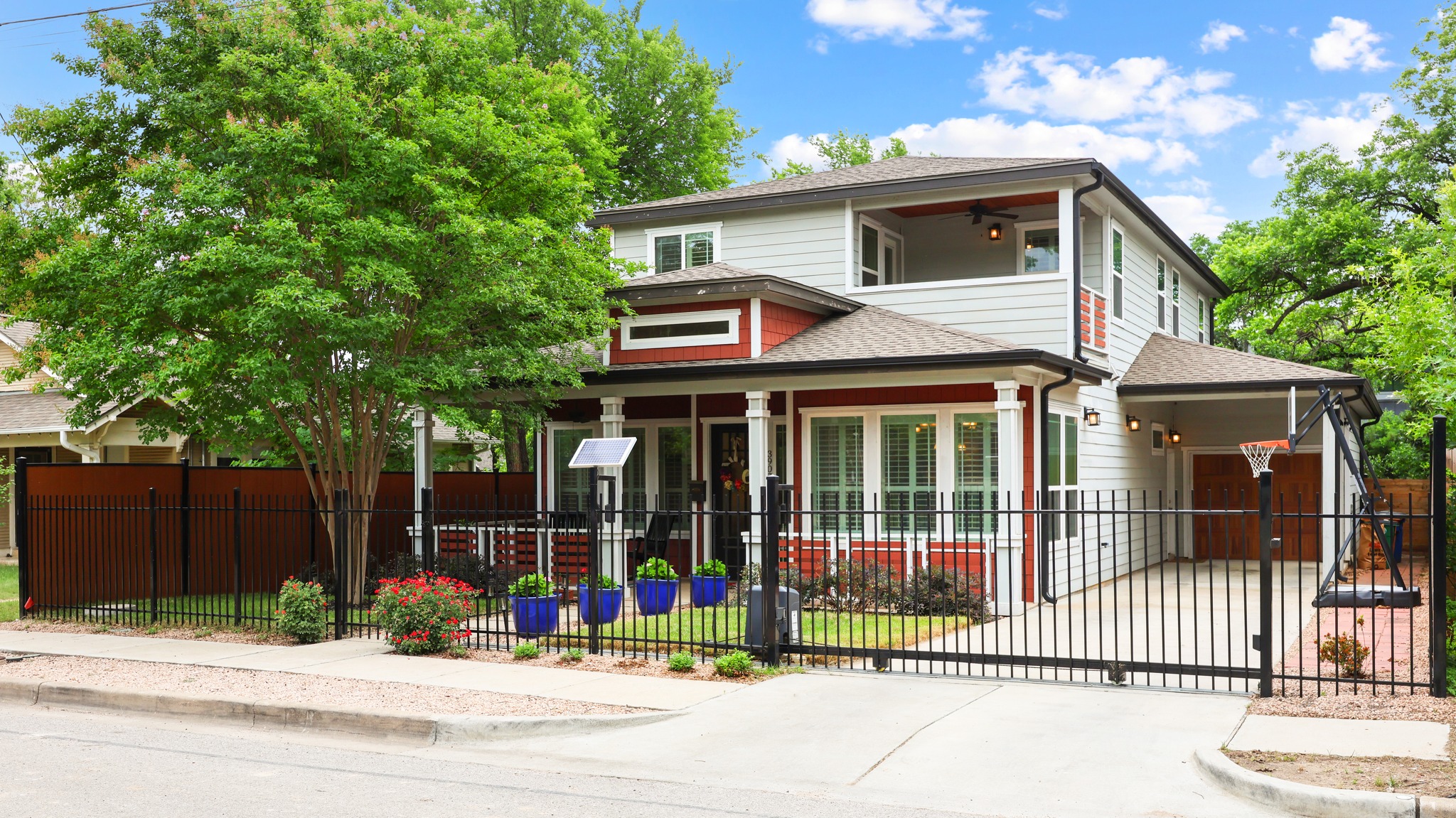 3907 Becker Avenue Austin, TX 78751 - Photo 6 of 33 Fully fenced front yard with electric gate. One car garage and carport are a bonus.