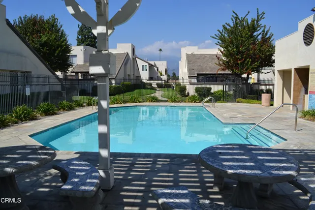 a view of a backyard with plants