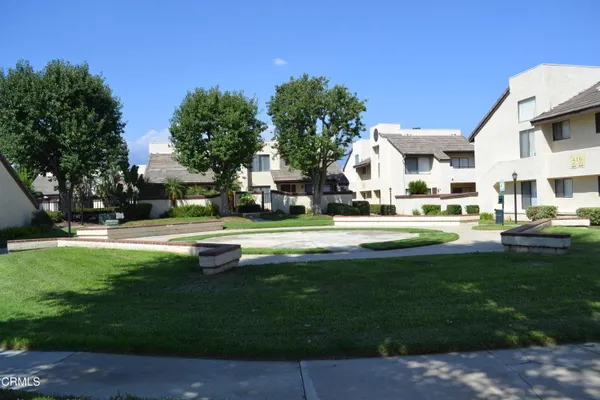 a garden view with a sitting space