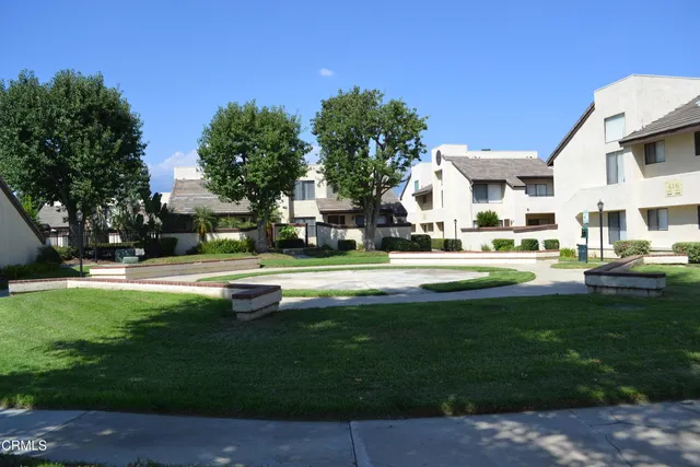 a garden view with a sitting space