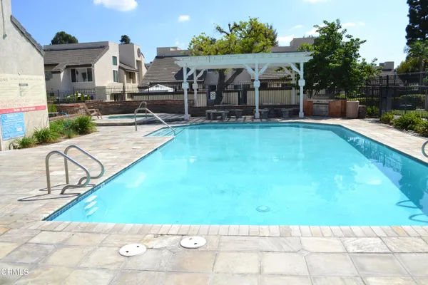 a view of a house with a swimming pool