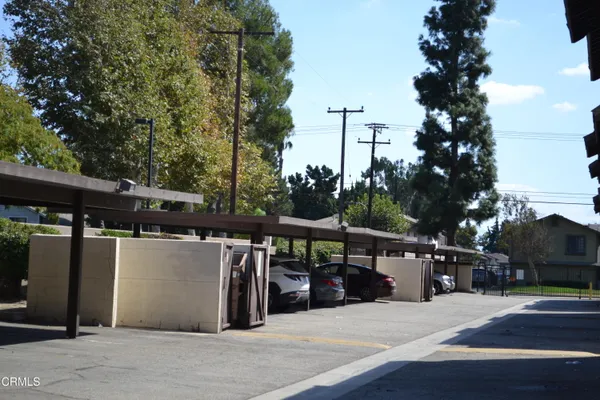 a view of balcony with floor to ceiling window and wooden floor
