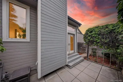 a view of house with backyard