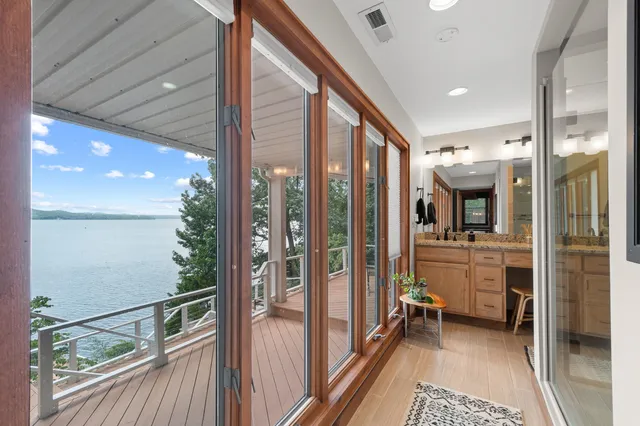 a bathroom with a tub and shower