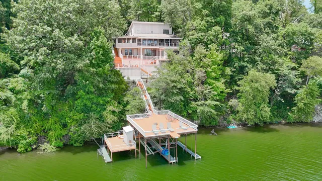a view of balcony with wooden floor
