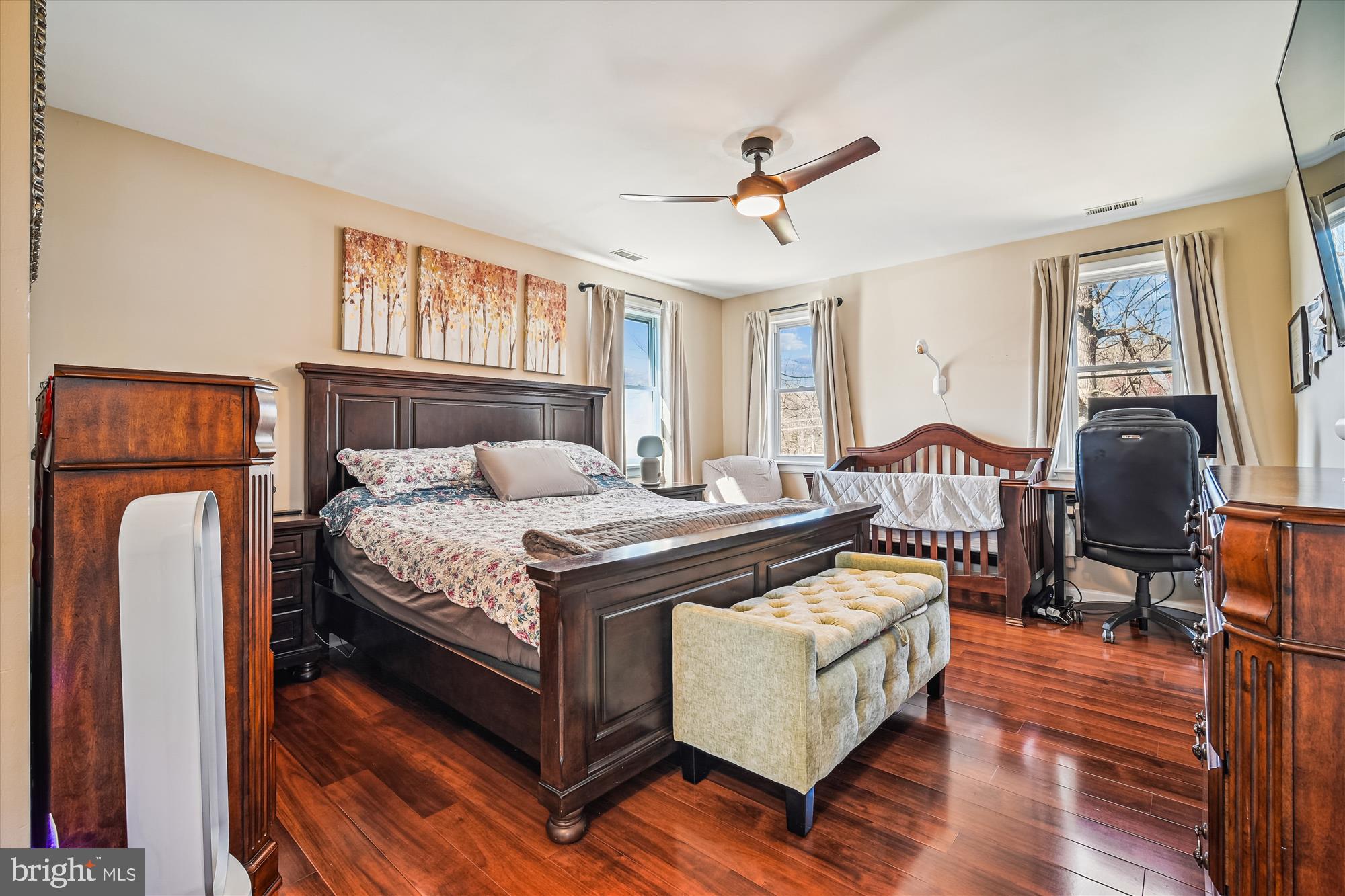 7314 Inzer Street Springfield, VA 22151 - Photo 11 of 37 a bedroom with a bed wooden floor and window