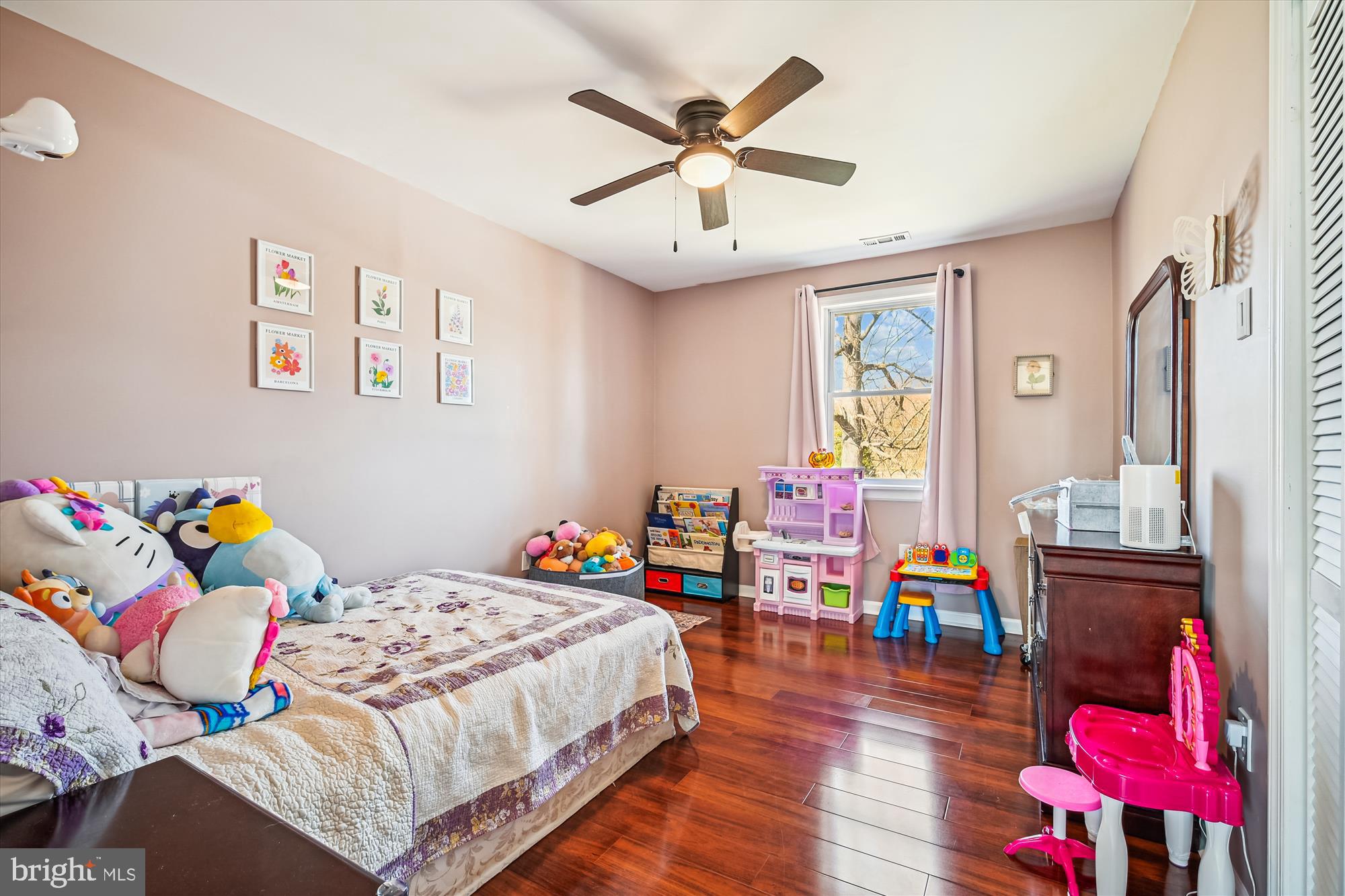 7314 Inzer Street Springfield, VA 22151 - Photo 16 of 37 a bedroom with furniture and a wooden floor