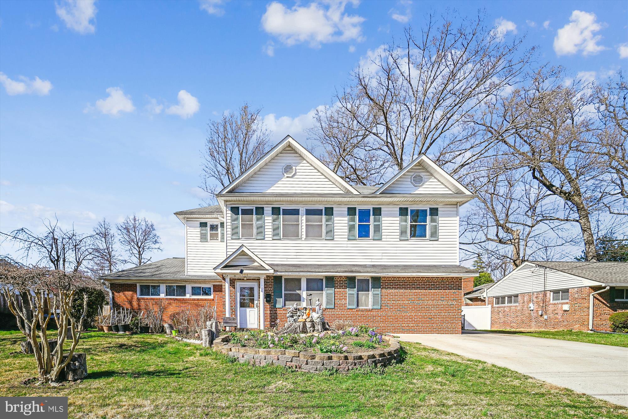 7314 Inzer Street Springfield, VA 22151 - Photo 2 of 37 a front view of a house with garden