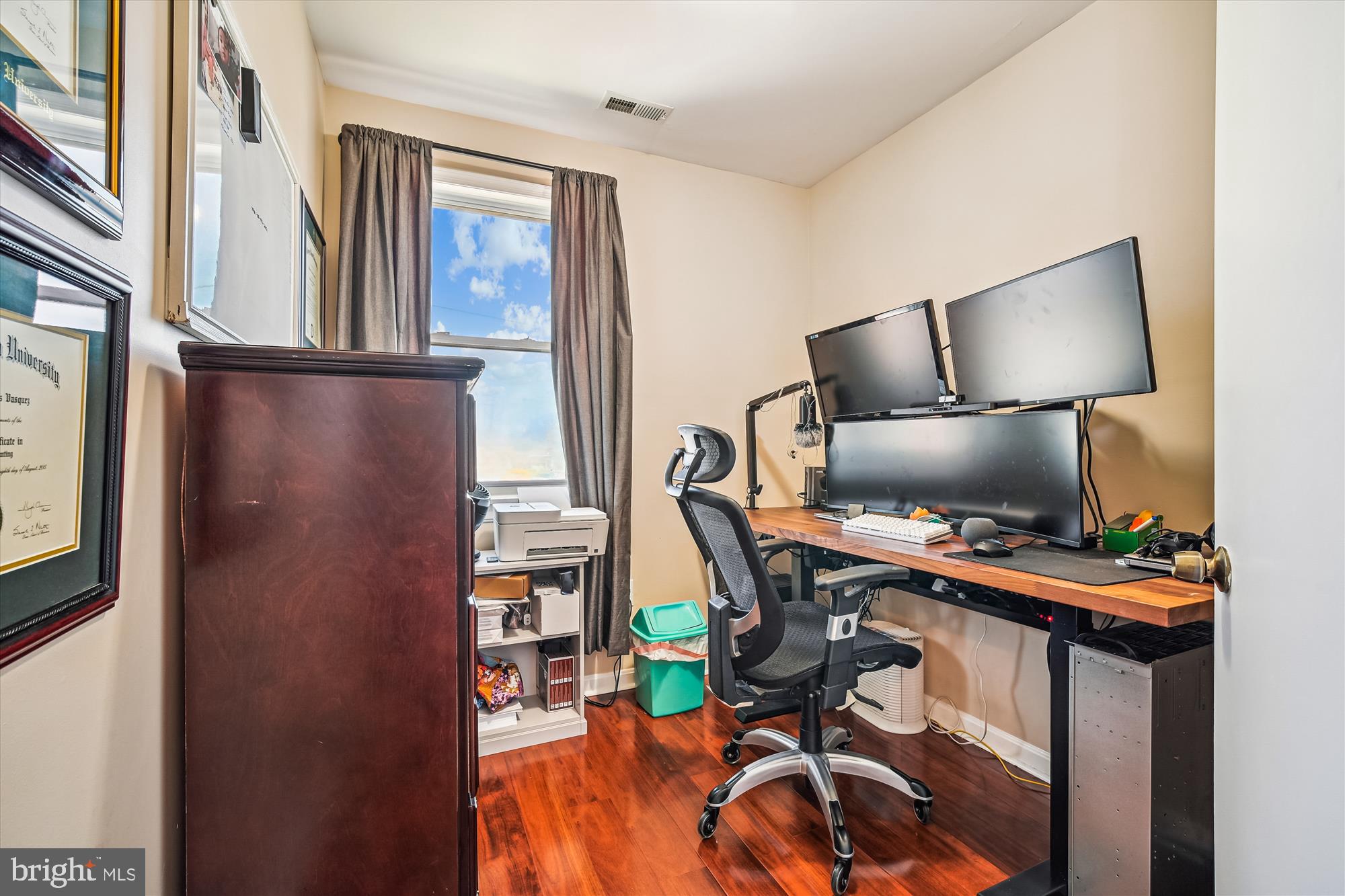 7314 Inzer Street Springfield, VA 22151 - Photo 23 of 37 a view of a workspace with furniture and a lamp