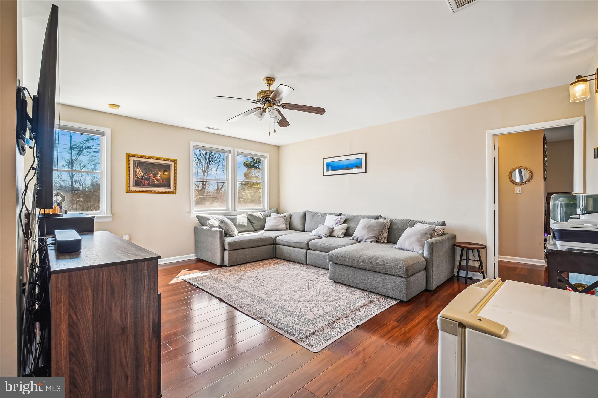 7314 Inzer Street Springfield, VA 22151 - Photo 25 of 37 a living room with furniture and wooden floor