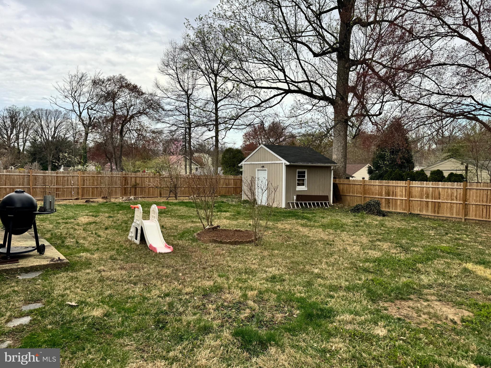 7314 Inzer Street Springfield, VA 22151 - Photo 36 of 37 a view of a house with backyard and a garden