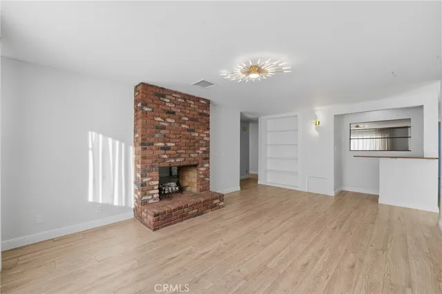 a bathroom with a sink vanity and a mirror