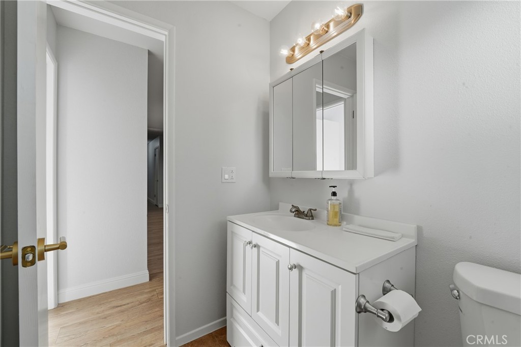 6255 Mitchell Avenue Riverside, CA 92505 - Photo 34 of 54 a bathroom with a sink vanity and a mirror