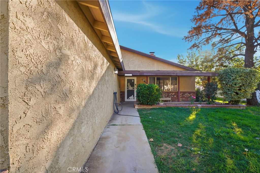 6255 Mitchell Avenue Riverside, CA 92505 - Photo 43 of 54 a view of patio with table and chairs and potted plants