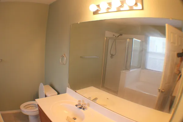 a bathroom with a sink and a vanity