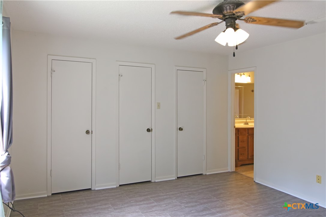 2406 Boyd Avenue Killeen, TX 76543 - Photo 16 of 22 wooden floor in an empty room with a window