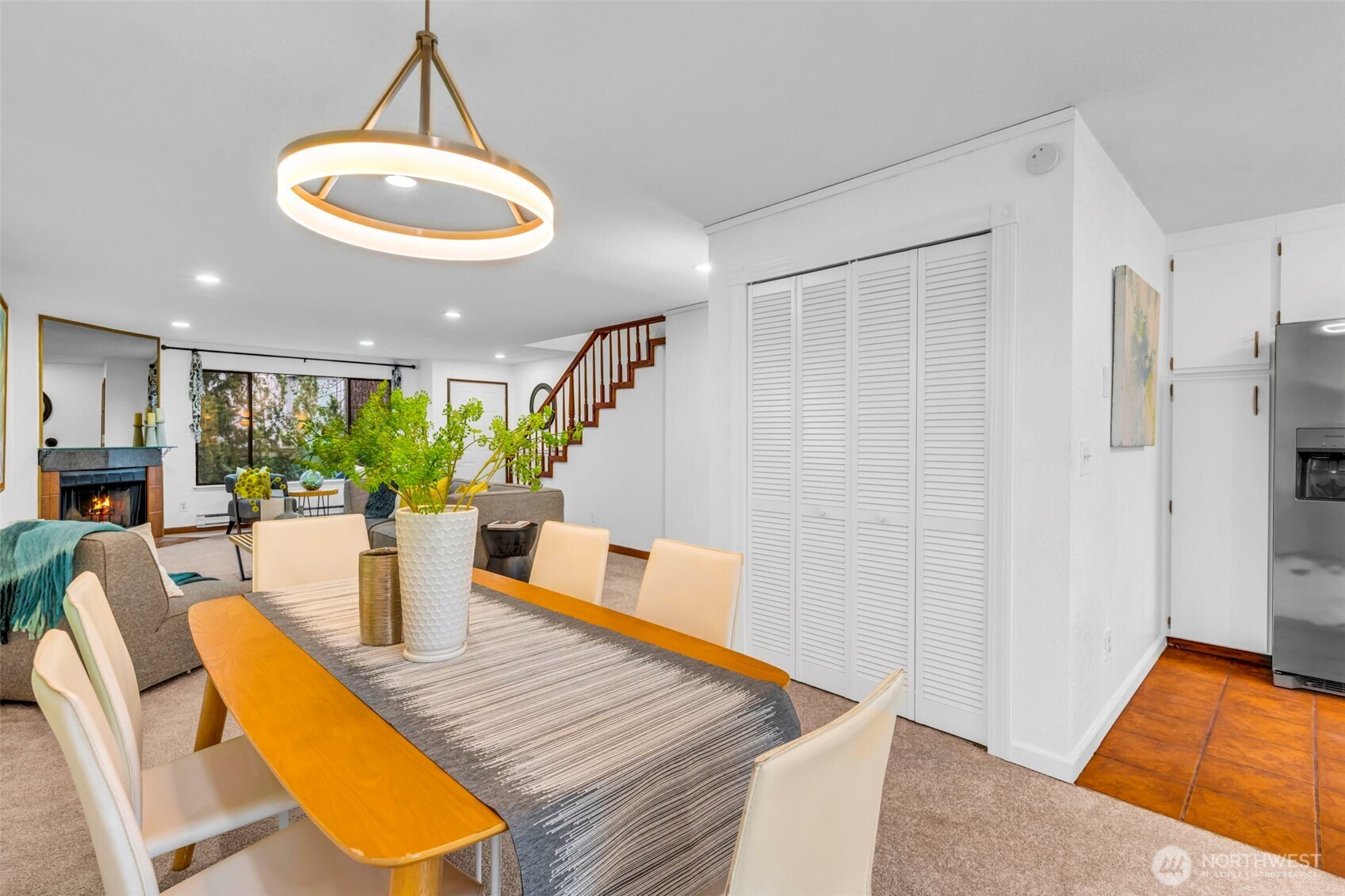 816 North 175th Street, Unit 2 Shoreline, WA 98133 - Photo 12 of 40 a view of a dining room with furniture window and wooden floor
