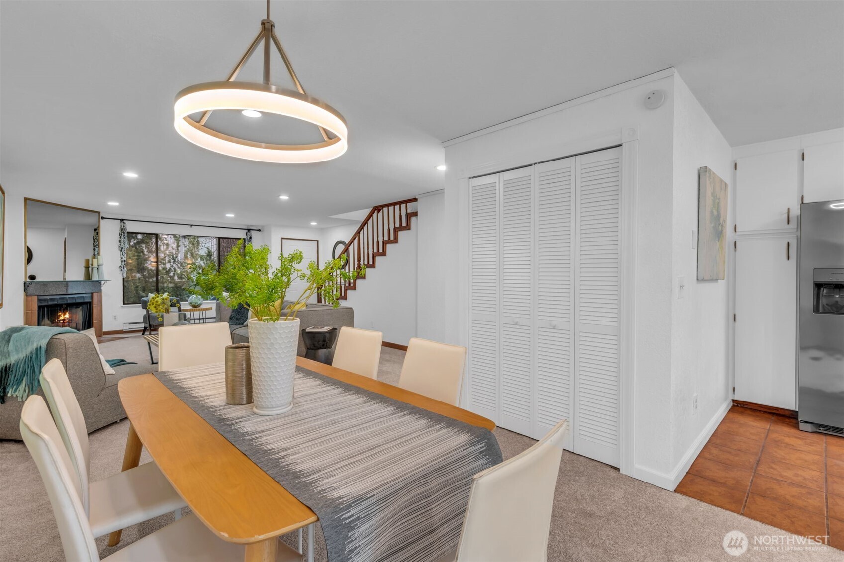 816 North 175th Street, Unit 2 Shoreline, WA 98133 - Photo 14 of 40 a view of a dining room with furniture window and wooden floor