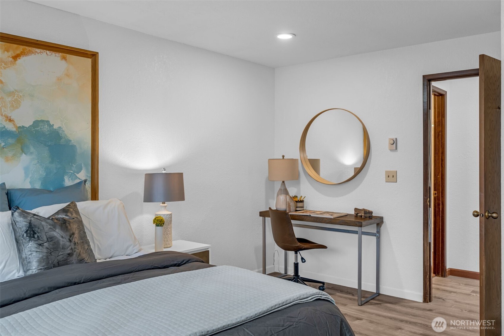 816 North 175th Street, Unit 2 Shoreline, WA 98133 - Photo 35 of 40 a bedroom with a bed and dresser