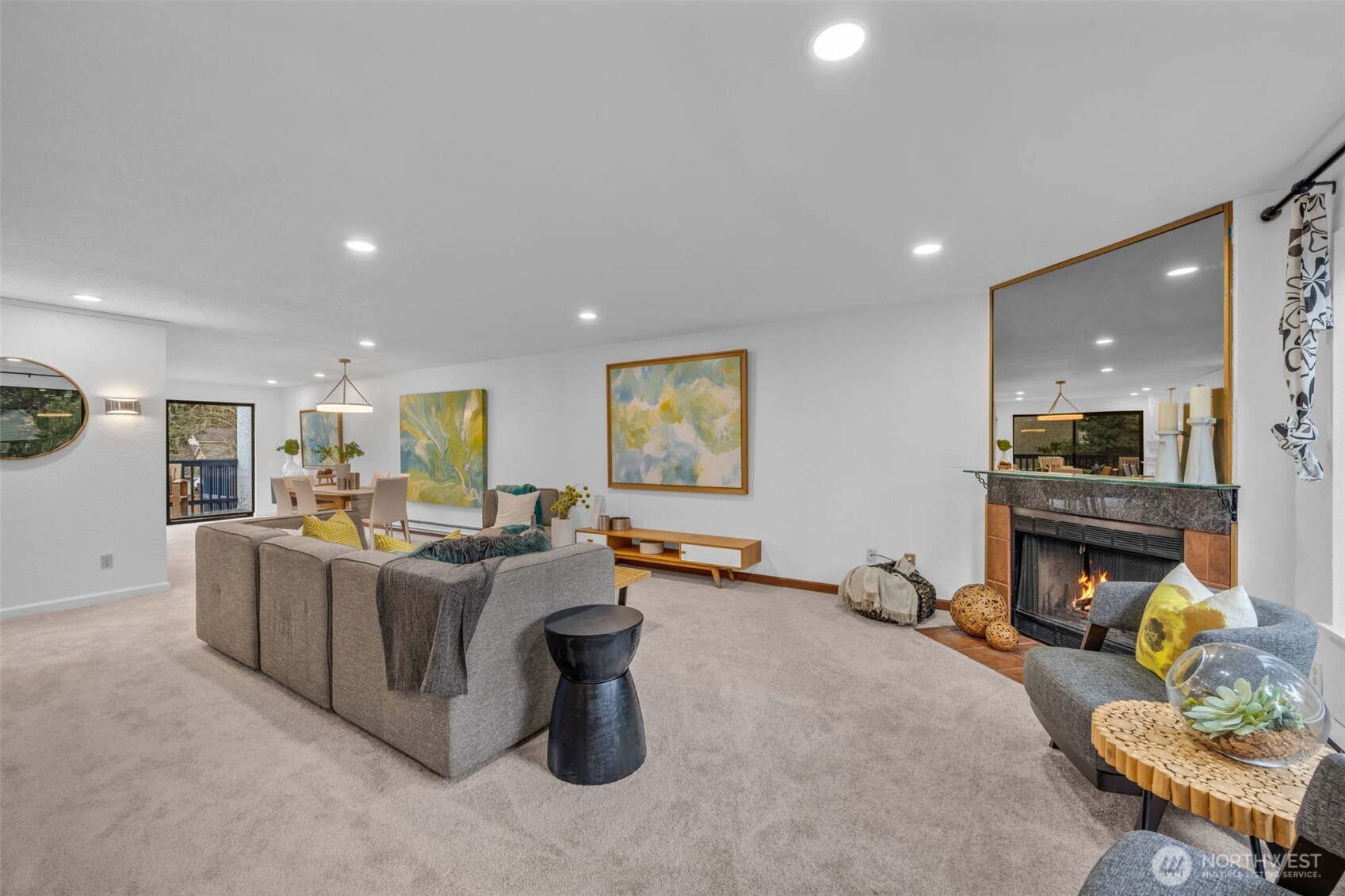 816 North 175th Street, Unit 2 Shoreline, WA 98133 - Photo 9 of 40 a living room with furniture and a fireplace
